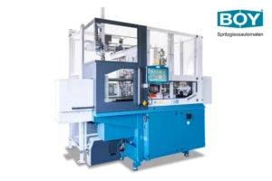 BOY 35 Electric with integrated BOY Handling system; 350kN clamping force, 280 x 254 mm clearance between tie bars and a max. shot weight of 69.5g (PS)